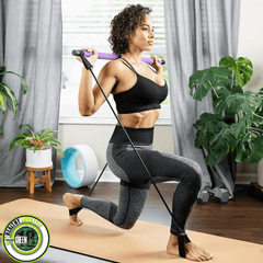 Portable Pilates bar kit with resistance bands and latex cords, fitness equipment for strength training and exercise routines.