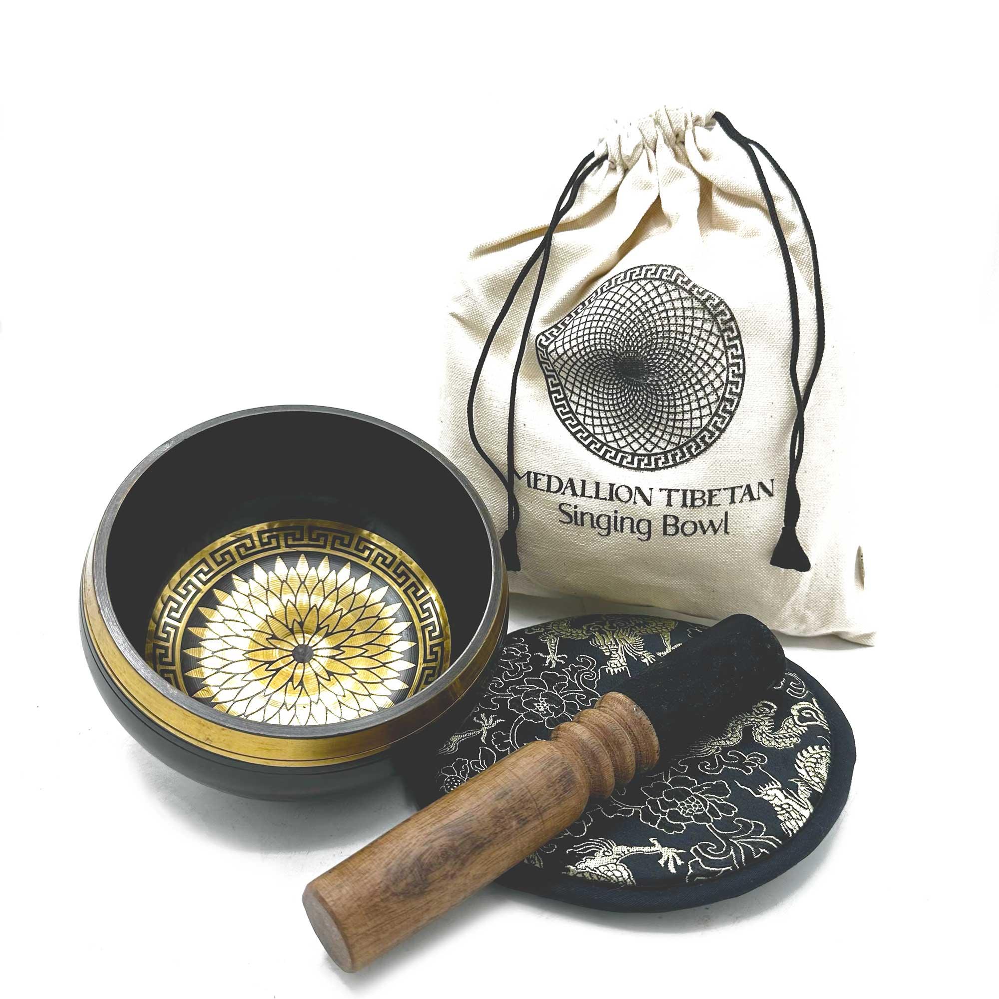 Hand-beaten and engraved AW Gifts singing bowl gift set with round medallions, 14cm diameter, includes accessory for meditation or relaxation.