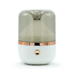 AW GIFTS Urban Aroma Diffuser in white and bronze with USB connection, featuring color-changing LED lights for a modern aromatherapy accessory.