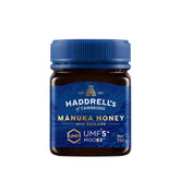 Herbalistas Haddrells Manuka Honey UMF5+ MGO83+ in 250g jar, golden honey with a smooth texture and natural floral aroma.