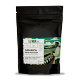 Green Life Premium Jamaica Blue Mountain Coffee bag by LA TOSTERIA, 250g, with vibrant packaging and coffee beans visible.