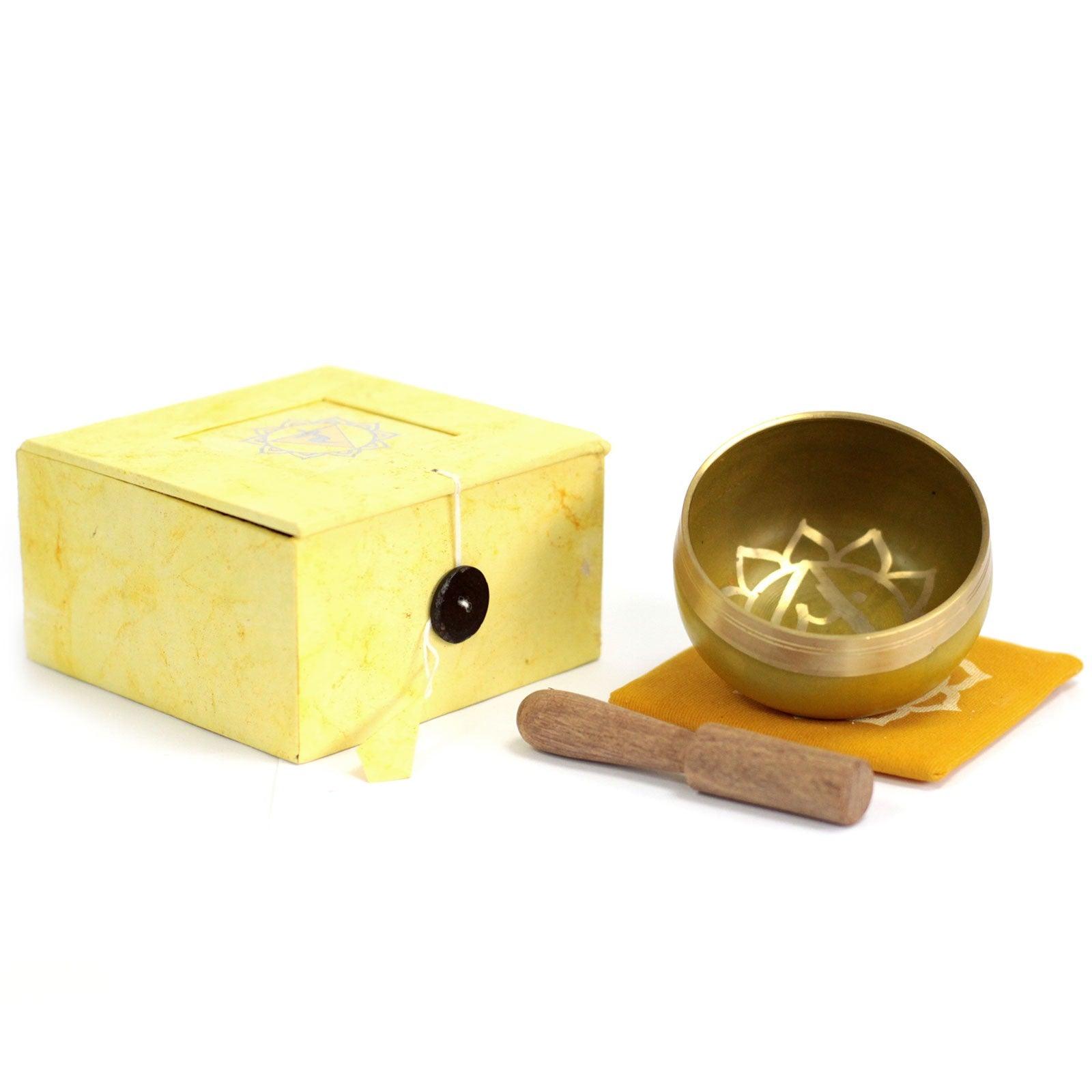 AW Gifts Chakra Singing Bowl for Solar Plexus, a musical accessory with intricate designs, used for meditation and sound therapy.
