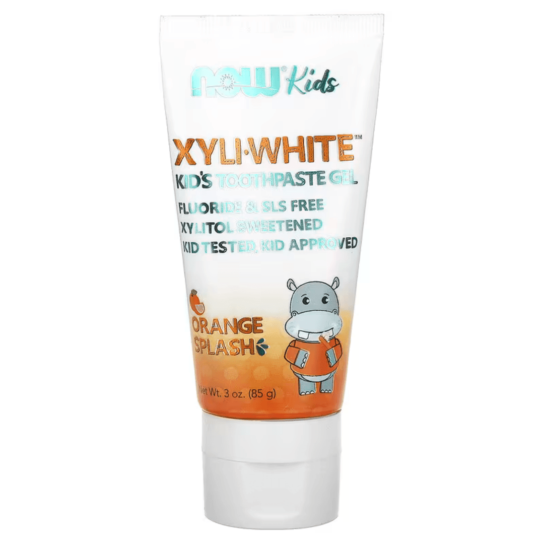 Kids toothpaste gel by NOW Foods, Xyli-White Orange Splash flavor, 3 oz, featuring a playful orange splash design on the tube.