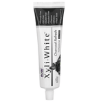 MKSTAVRINOS XyliWhite Charcoal Refresh Toothpaste Gel with mint flavor in 6.4 oz tube, featuring black and white packaging.