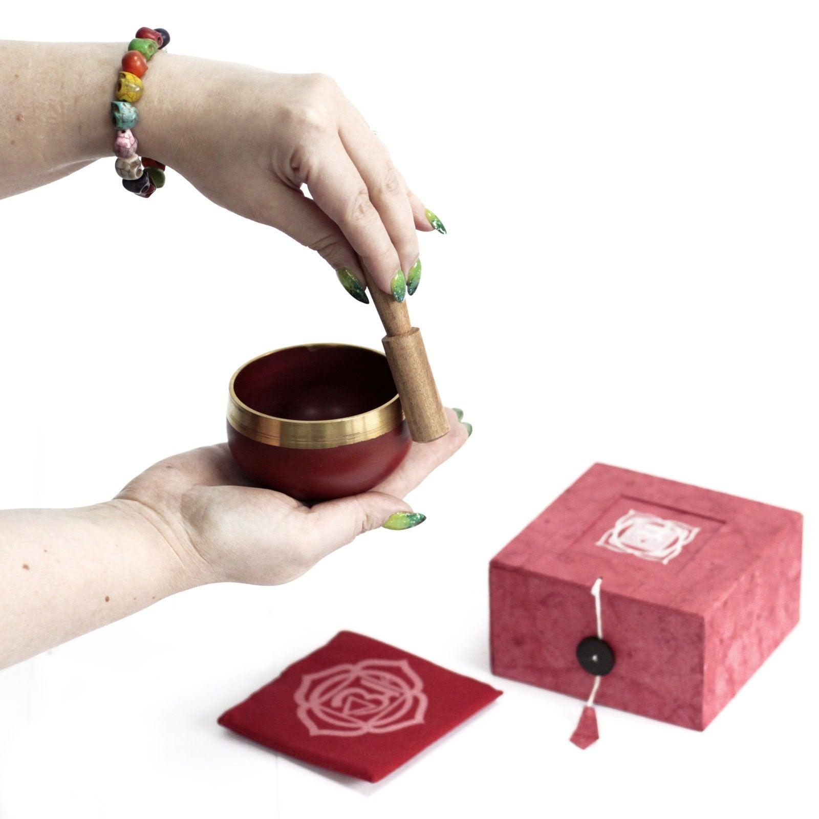 AW GIFTS Chakra Singing Bowl - Root, a brass accessory for meditation and chakra balancing, showing intricate engraved design.