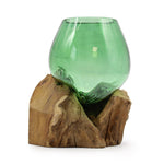 Handmade small bowl made from recycled beer bottle on natural wood base, ideal for eco-friendly home decor.
