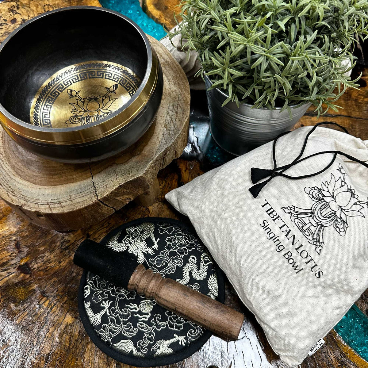 Hand-beaten and engraved 14cm AW Gifts singing bowl with lotus flower design, perfect as a spiritual or meditation accessory.