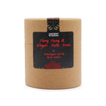 Ylang Ylang and ginger bath bomb by AW GIFTS, single-piece bath product with floral and spicy scent, relaxing bath setting.