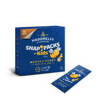 Herbalistas Haddrells Manuka Honey UMF5+ single-serve sachets for kids, 10-pack, featuring golden honey in individual packets