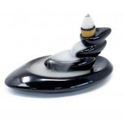 Small back flow incense burner with pebbles by AW GIFTS, showcasing a decorative accessory for incense relaxation.