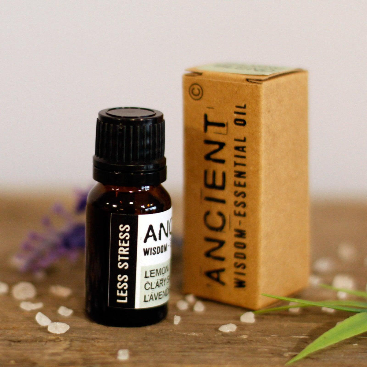 AW GIFTS Less Stress essential oil blend in 10ml boxed container, skin care product with calming aromatherapy features.