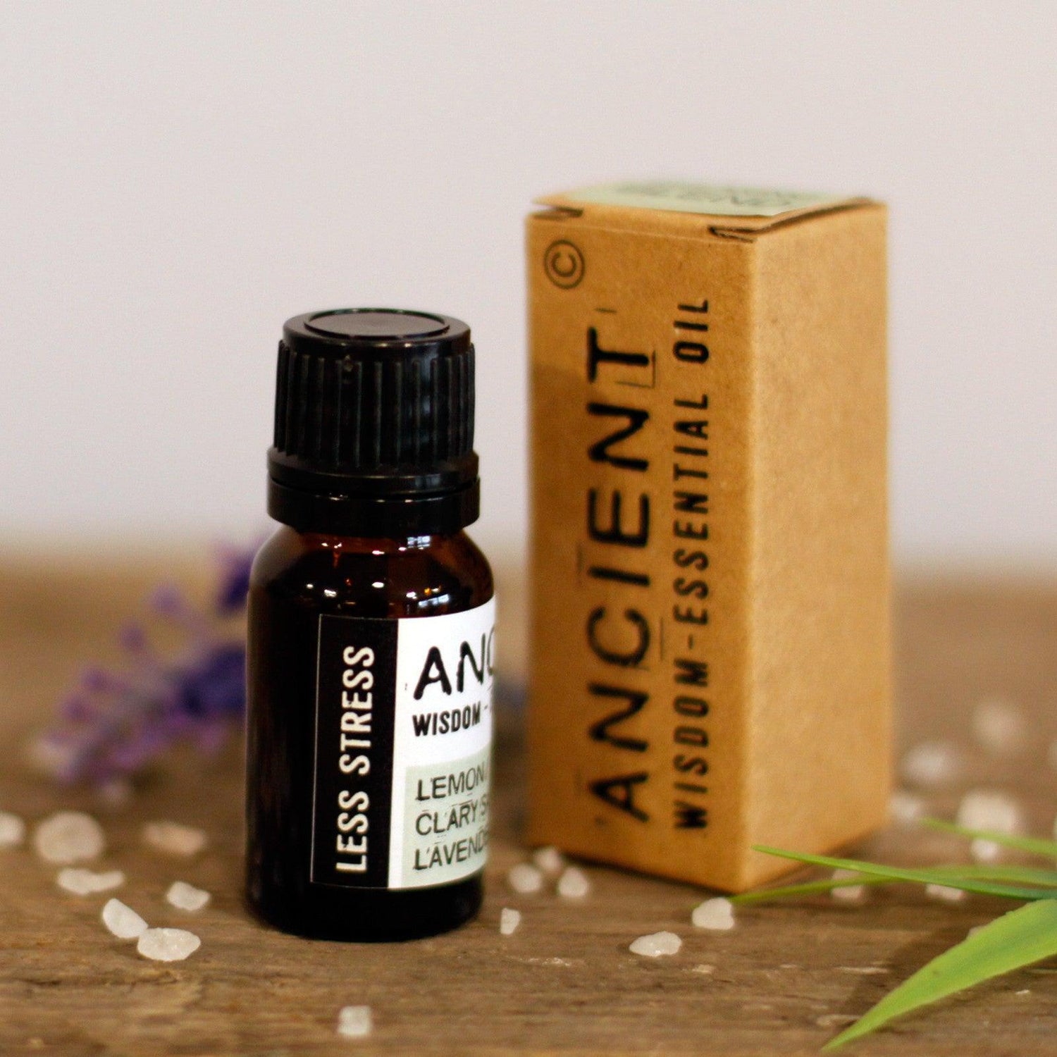 AW GIFTS Less Stress essential oil blend in 10ml boxed container, skin care product with calming aromatherapy features.