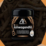 Herbalistas MountainDrop Shilajit 25g blend with Ashwagandha and raw chestnut honey, displayed in a jar with ingredients around it.