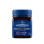 Jar of Herbalistas Haddrells Manuka Honey UMF5+ with MGO83+ in a 250g container, showing the honey's golden, viscous texture.
