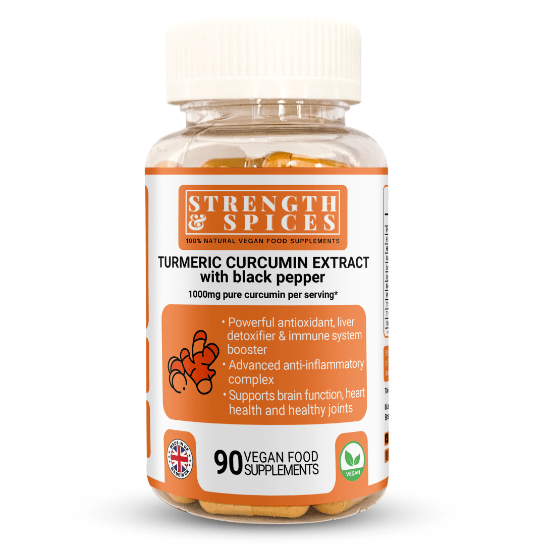 Bottle of STRENGTH & SPICES Turmeric Curcumin 1000mg supplement with turmeric spice capsules on a white background.