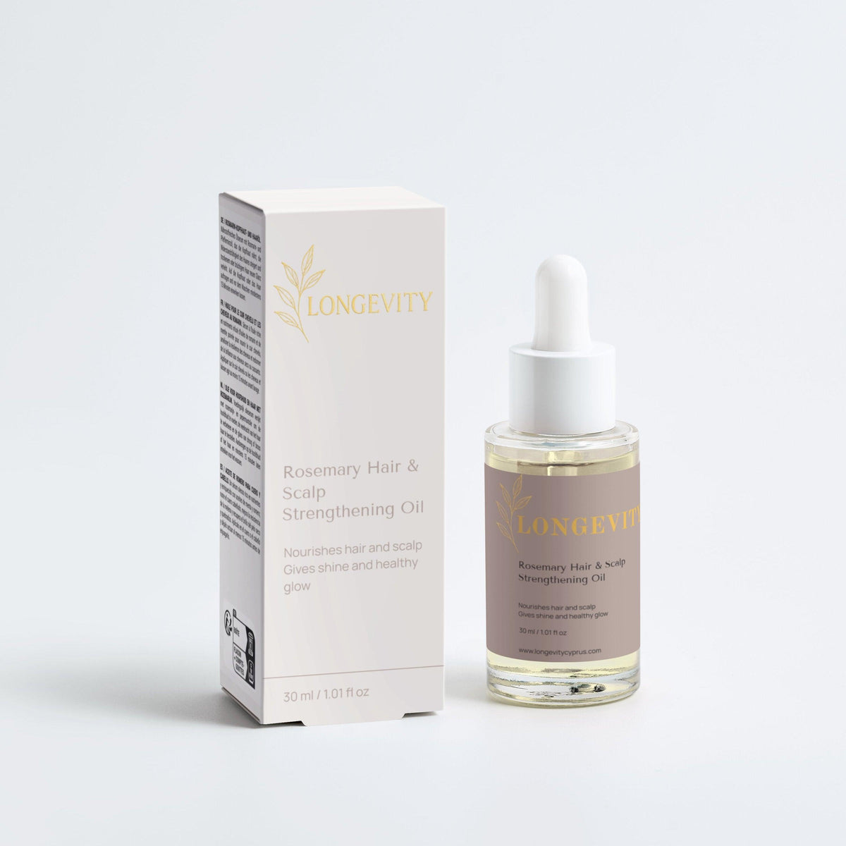 SELNAMED Longevity Rosemary Hair & Scalp Strengthening Oil bottle with rosemary sprigs and natural ingredients on a white background