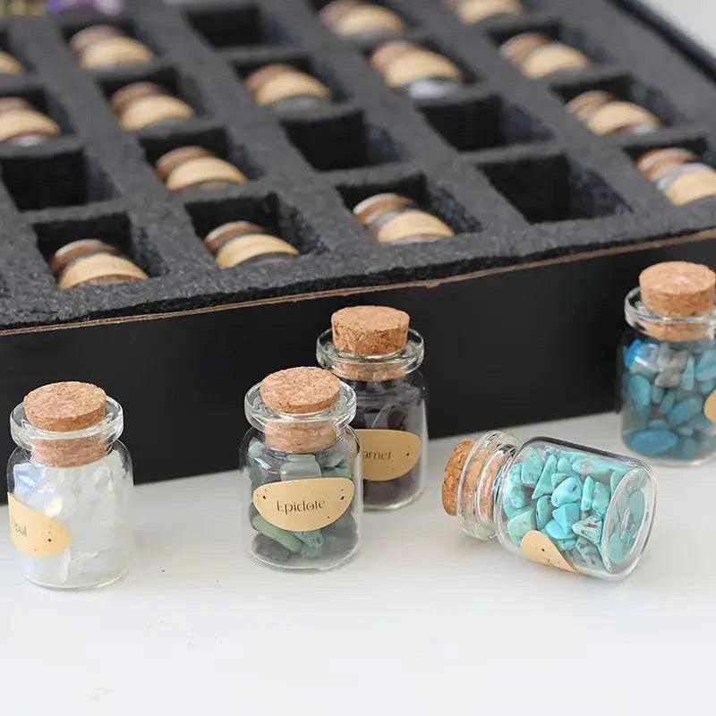 Set of 55 natural gemstone crystal bottles from TEMU, featuring colorful, polished mineral specimens in small glass bottles.