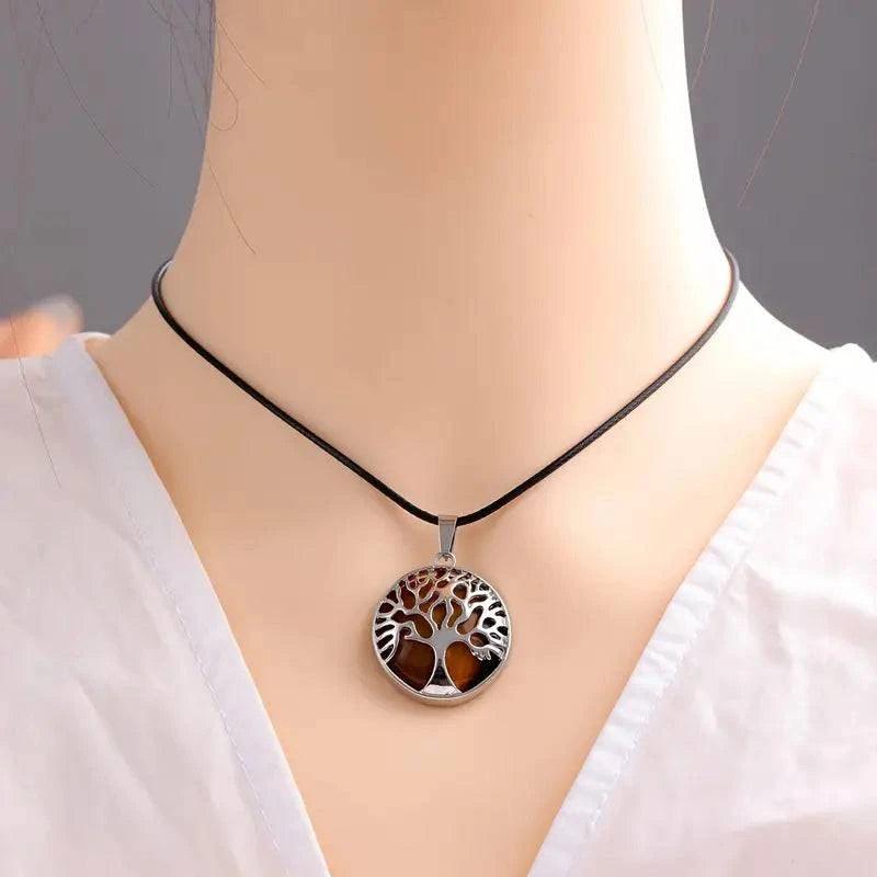 Tree of Life natural stone pendant on chakra necklace, energy stone crystal jewelry for women and men, with intricate design.
