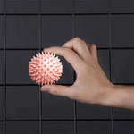 Portable massage ball by TEMU, showing a compact, textured massage ball perfect for muscle relief and relaxation.