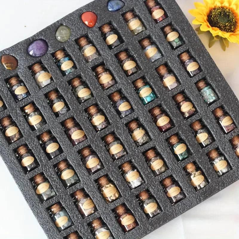 Set of 55 natural crystal gemstone bottles from TEMU, featuring assorted colorful mineral specimens in clear glass bottles.