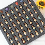 Set of 55 natural crystal gemstone bottles from TEMU, featuring assorted colorful mineral specimens in clear glass bottles.