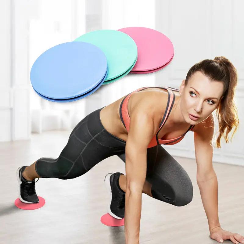Pair of TEMU core sliders for fitness equipment, compact abdominal strengthening tools with smooth plastic surfaces and non-slip grips.