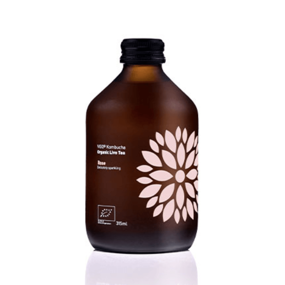Herbalistas VIGO Kombucha Longbrew BIO Rose tea in 330ml bottle with rose floral label and clear glass showing the beverage inside
