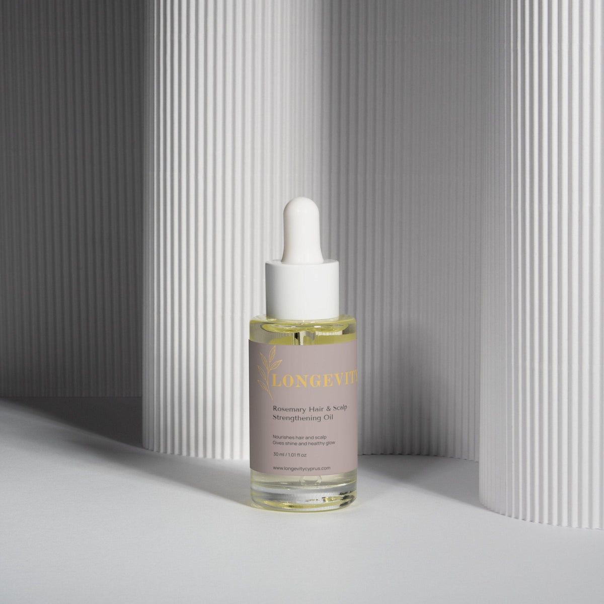 SELNAMED Rosemary Hair & Scalp Strengthening Oil bottle with rosemary sprigs, promoting healthy hair and scalp care.