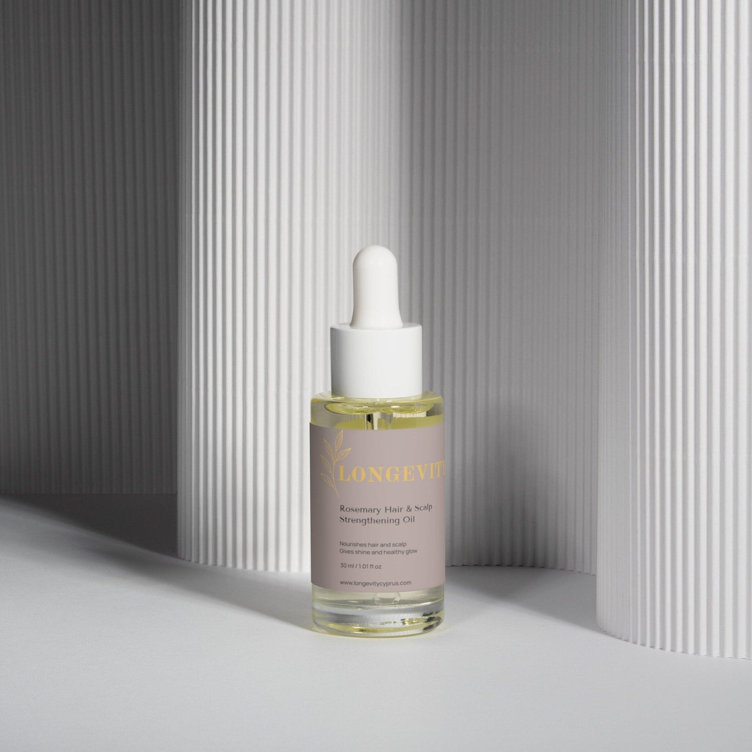 SELNAMED Rosemary Hair & Scalp Strengthening Oil bottle with rosemary sprigs, promoting healthy hair and scalp care.