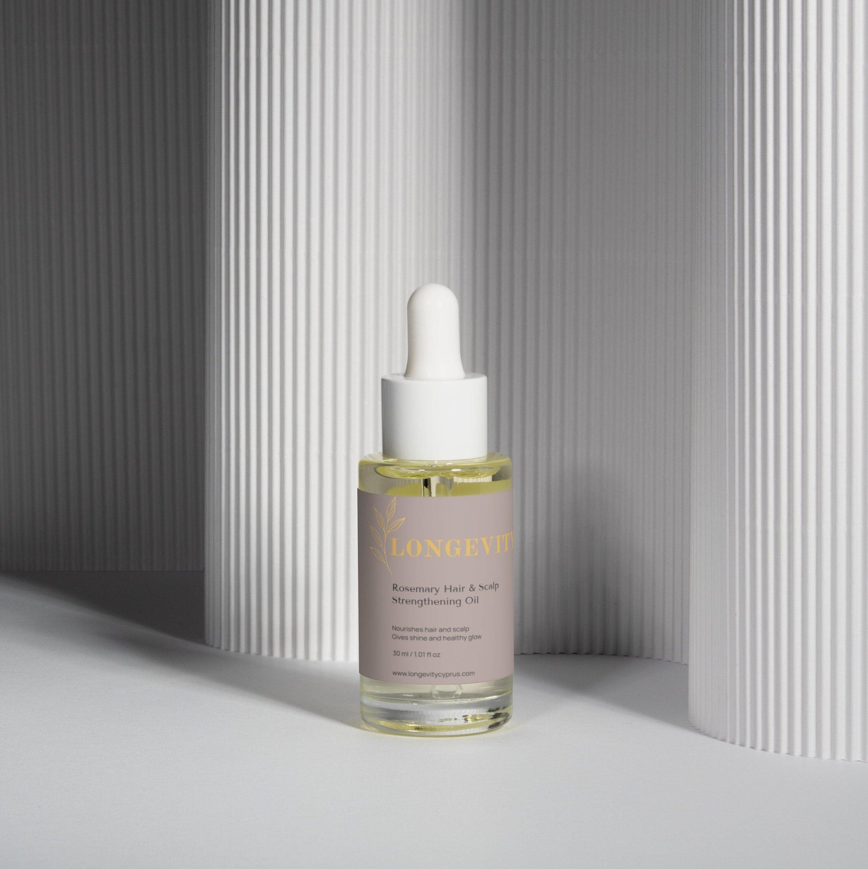 SELNAMED Rosemary Hair & Scalp Strengthening Oil bottle with rosemary sprigs, promoting healthy hair and scalp care.