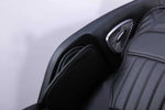 VIKING FITNESS A-310 massage chair in black, showing the sleek padded design with arm and leg massage features.