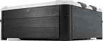 Viking Fitness MSpa Oslo Plus outdoor hot tub with seating and controls, set up outdoors for relaxing spa experience.
