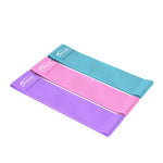 Set of Genius Nutrition Resistance Bands GG-1 for fitness exercises, showing colorful elastic resistance bands on a white background.