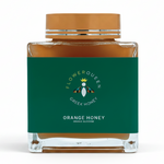 LV Natural Foods Queen Orange Honey 500g, a superfood jar of natural orange-flavored honey with a golden appearance.
