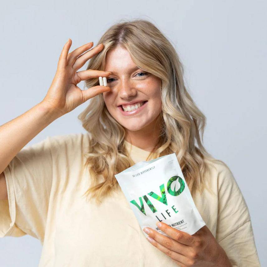 Vivo Life vegan multinutrient and mineral supplement bottle with colorful label on a white background.