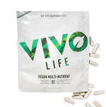 Vivo Life vegan multinutrient and mineral supplement bottle with colorful label and capsules, on a white background.