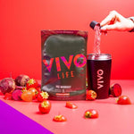 Vivo Life pre workout supplement container with label, showing a healthy lifestyle with fresh ingredients and vibrant colors.