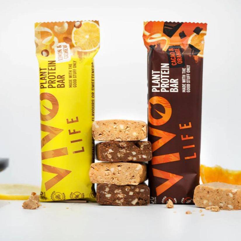 Vivo Life Lemon and Cashew Plant Protein Bars, energy snack with lemon flavor and cashews, on a white background.