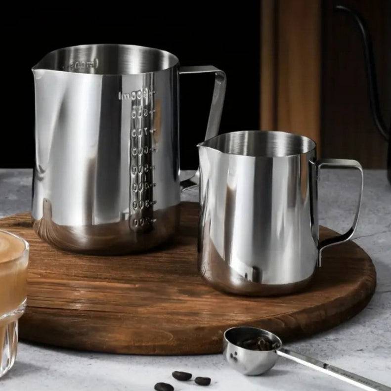 Stainless steel milk frothing pitcher by TEMU, with a handle and spout for steaming and pouring milk.