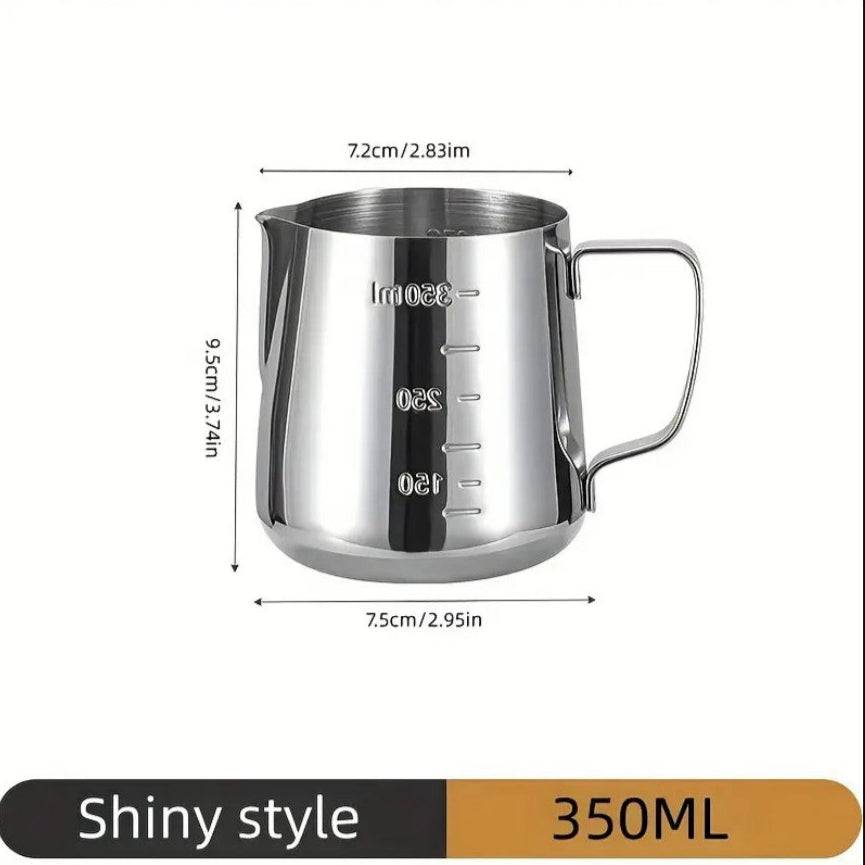 Stainless steel milk frothing pitcher by TEMU with a handle, used for steaming and pouring frothed milk.