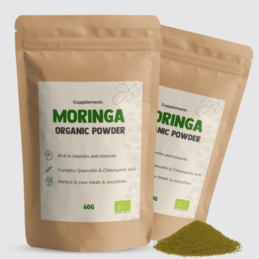 CUPLEMENT BIO Moringa Powder superfood in a 60g package, vibrant green powder in a clear jar with label.