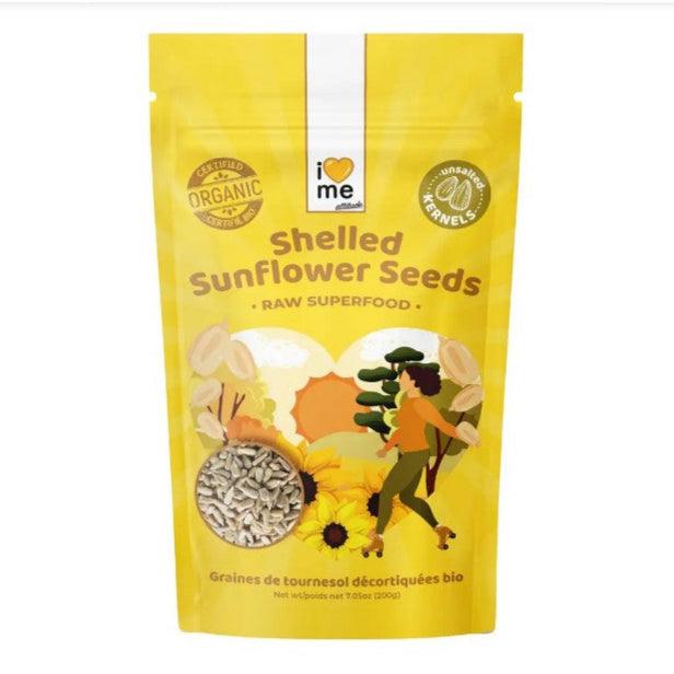 Organic raw hulled sunflower seeds in a 200g package from ILOVE ME, close-up showing the seeds in a clear container.