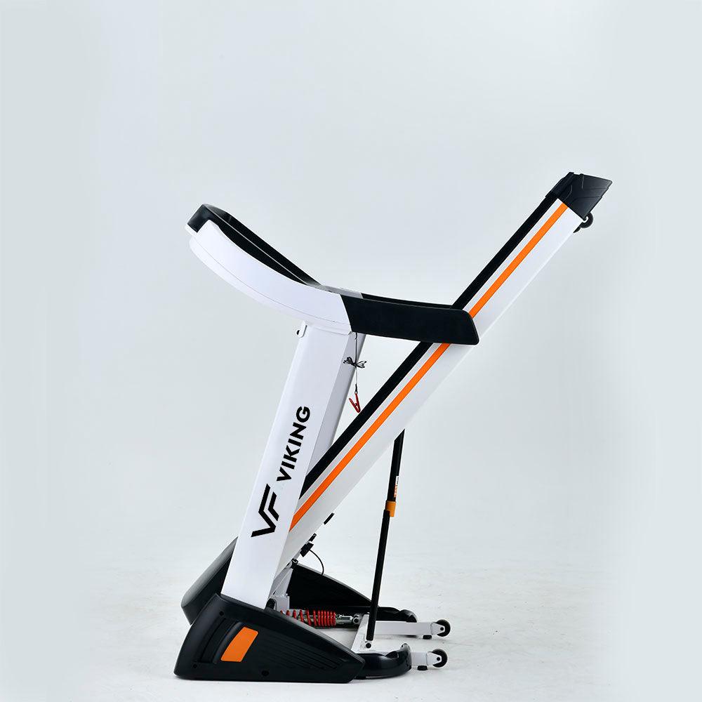 Folded Viking FITNESS D-55 Uranus electric treadmill with black frame and control panel, ready for storage or use.