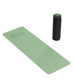Green Genius Nutrition TPE yoga mat for fitness exercises, showcasing textured surface and non-slip design.