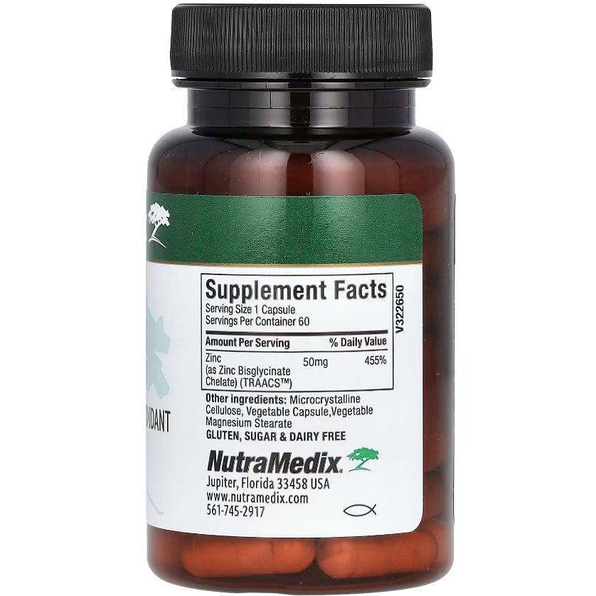 Old Products Zinc supplement, 50 mg zinc vegetable capsules, dietary supplement bottle with capsules visible.