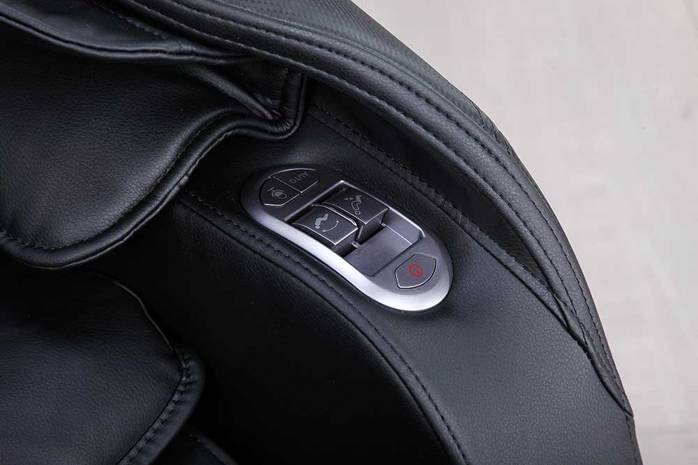 VIKING FITNESS A-310 massage chair in black with detailed close-up showing plush upholstery and ergonomic design.