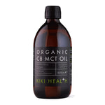 Herbalistas Kiki Health Organic C8 MCT Oil supplement bottle, 500ml, with a clear label and dropper cap on a white background.