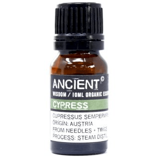 Cypress essential oil bottle from AW Gifts, 10ml, showing clear glass container with a white label and green cypress leaves in the background.