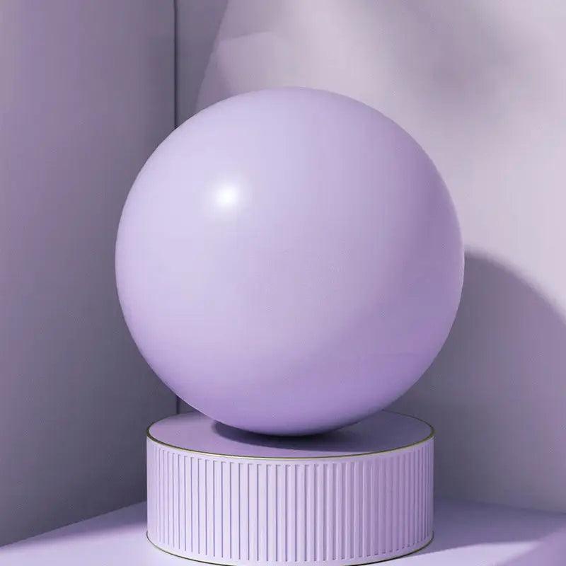 TEMU premium thick Pilates ball, 24.99cm diameter, accessory for fitness and core exercises, shown in a close-up image.