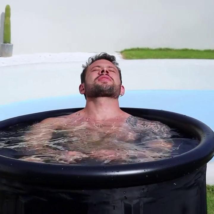 XL portable ice bath tub with insulated cover, ideal for cooling and recovery, shown in a clear outdoor setting.
